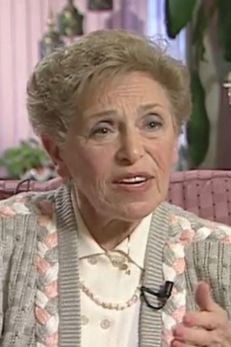A holocaust survivor speaks during an interview.