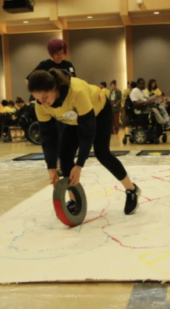 woman painting with a wheel