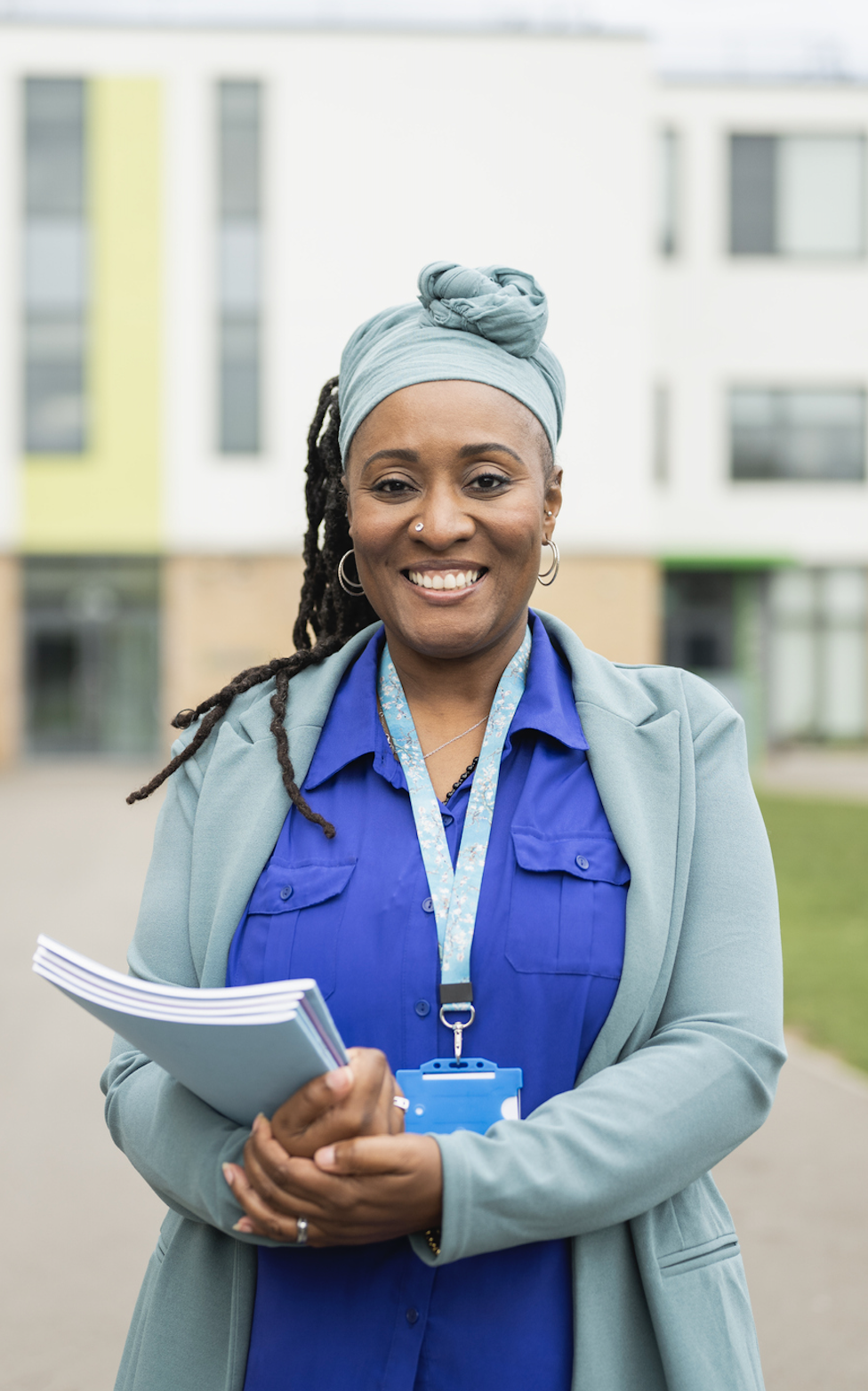 teacher with documents