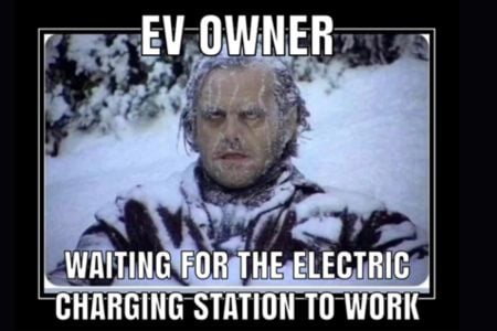 Meme showing a frozen man labeled “EV owner waiting for the electric charging station to work” illustrating common concerns about electric vehicle charging infrastructure.