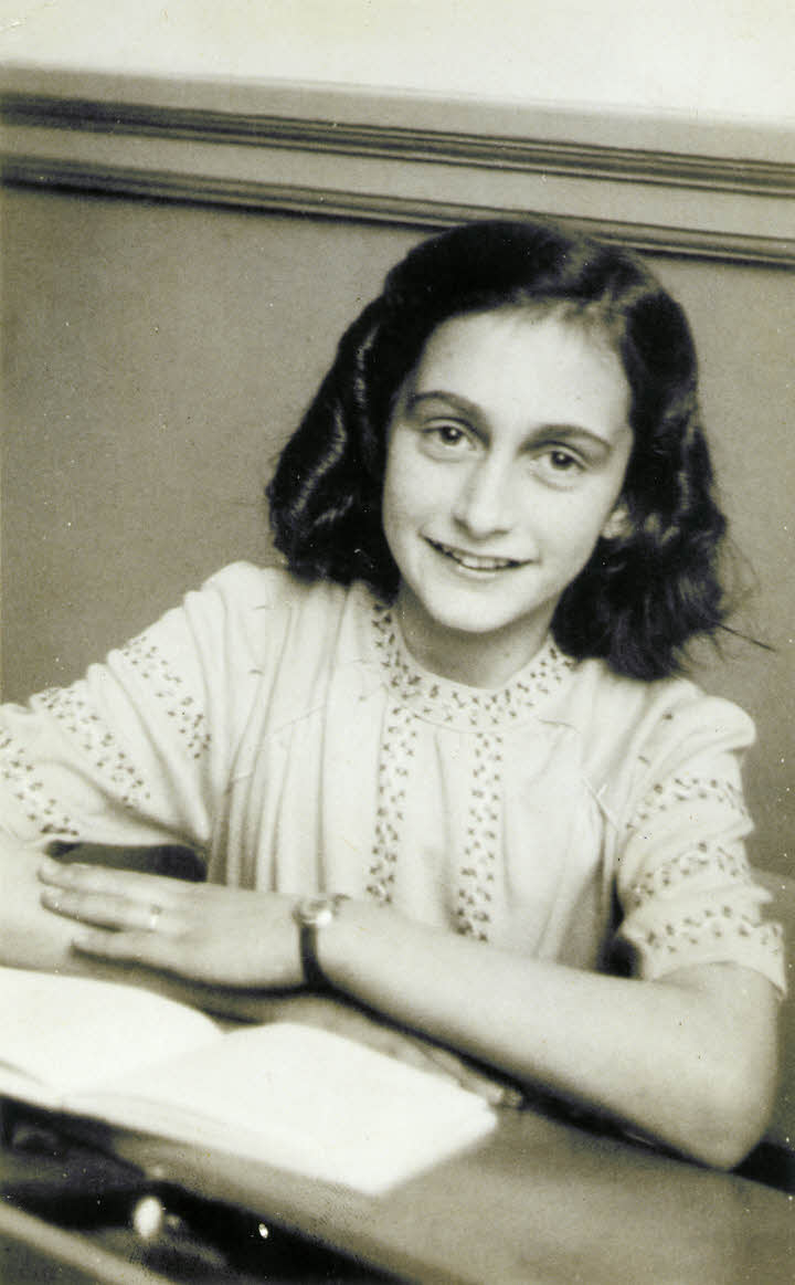 Anne Frank laughing at the school photographer taking her picture. Anne helped shape the author's choices in her professional career.
