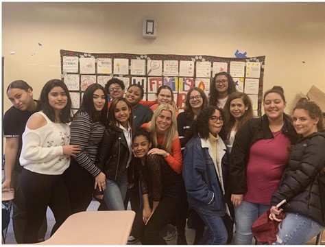 feminist club members at an in person meeting