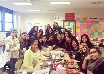 feminist club members at an in person meeting