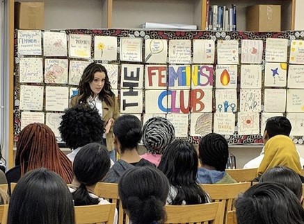 feminist club members at an in person meeting